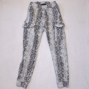 Women’s boutique jean joggers. Size S. Snake print